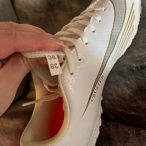 Amazon Women's White and Gold Athletic Shoes